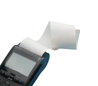 the image is of receipt tape unfurling from a credit card machine