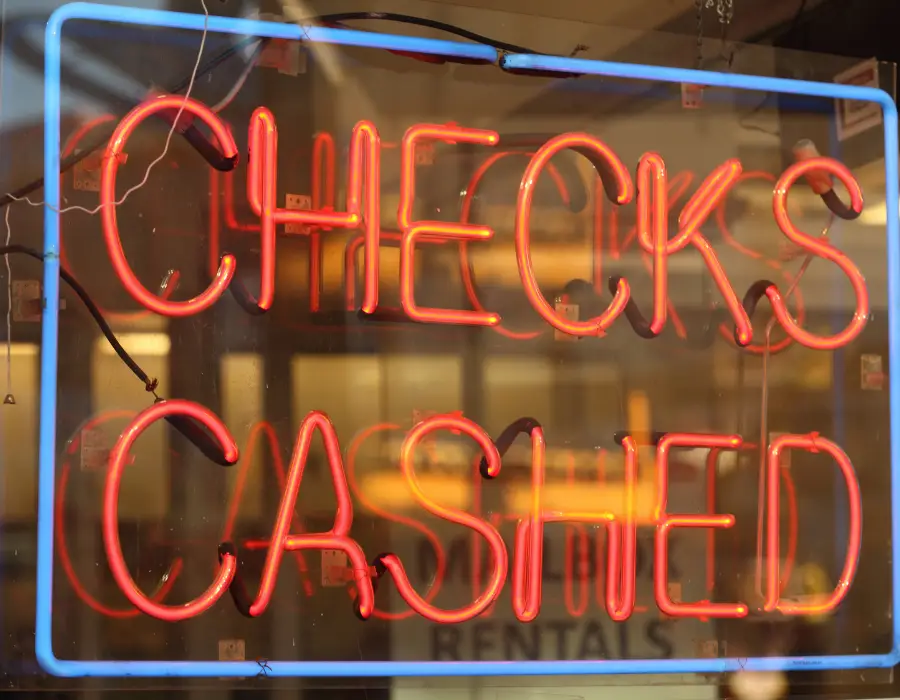 Checks Cashed Neon Sign - Unbanked households